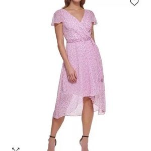 DKNY Wrap style dress with sheer overlay and fluttering sleeves